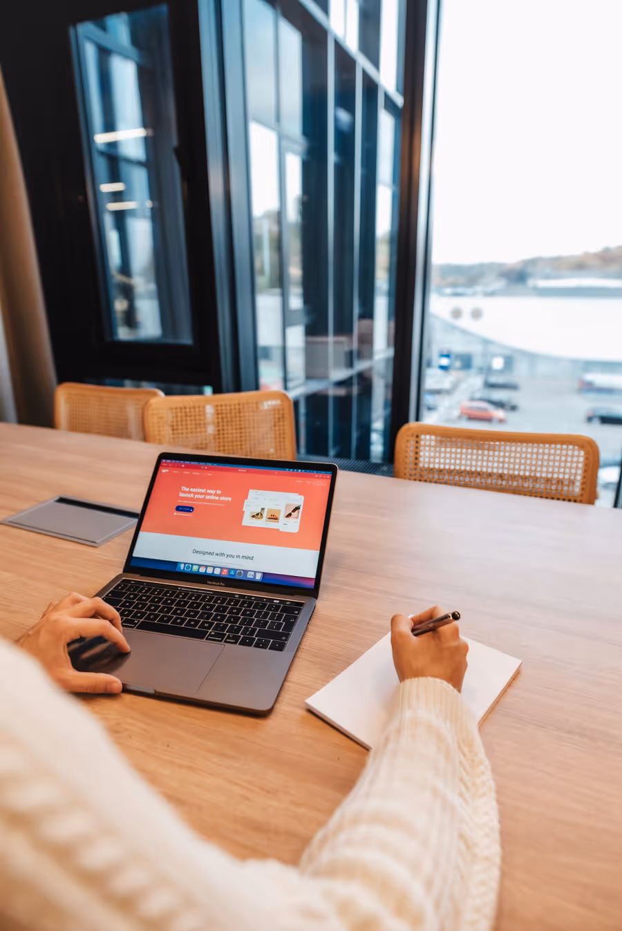 Laptop showing a website design workspace